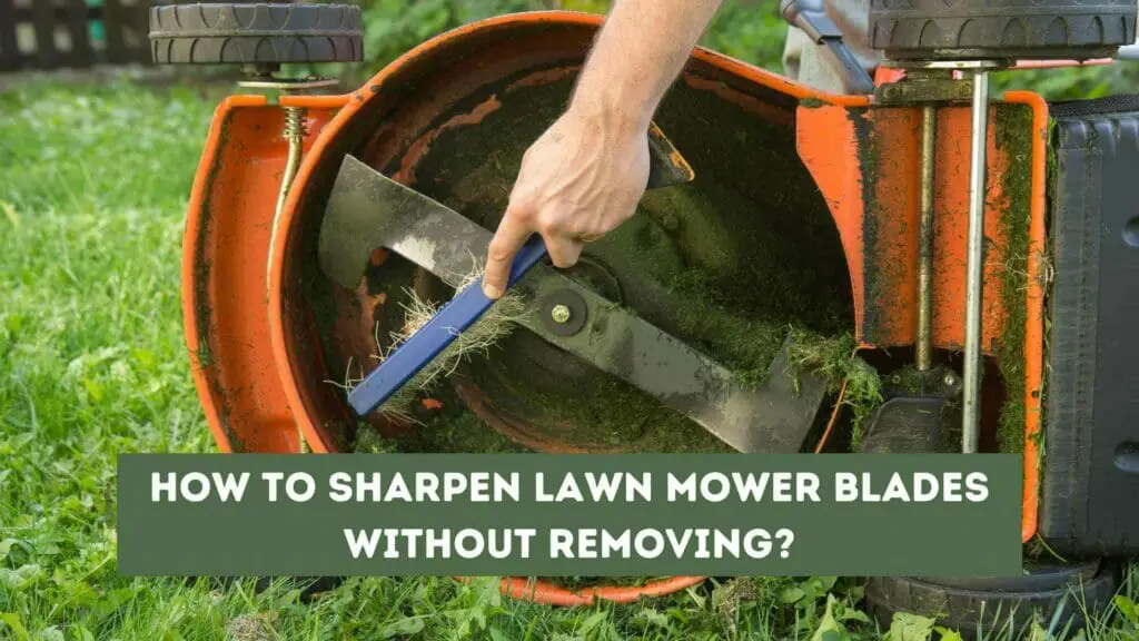 Photo of a lawn mower tipped to the side and its owner sharpening the blades. How to sharpen lawn mower blades without removing them?