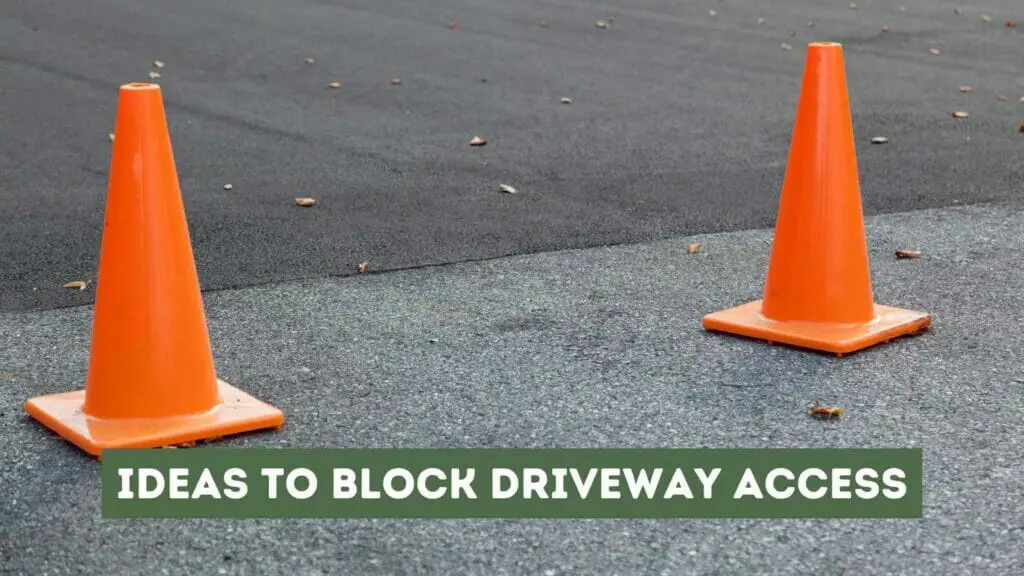Photo of two orange cones blocking the driveway. Ideas to Block Driveway Access.